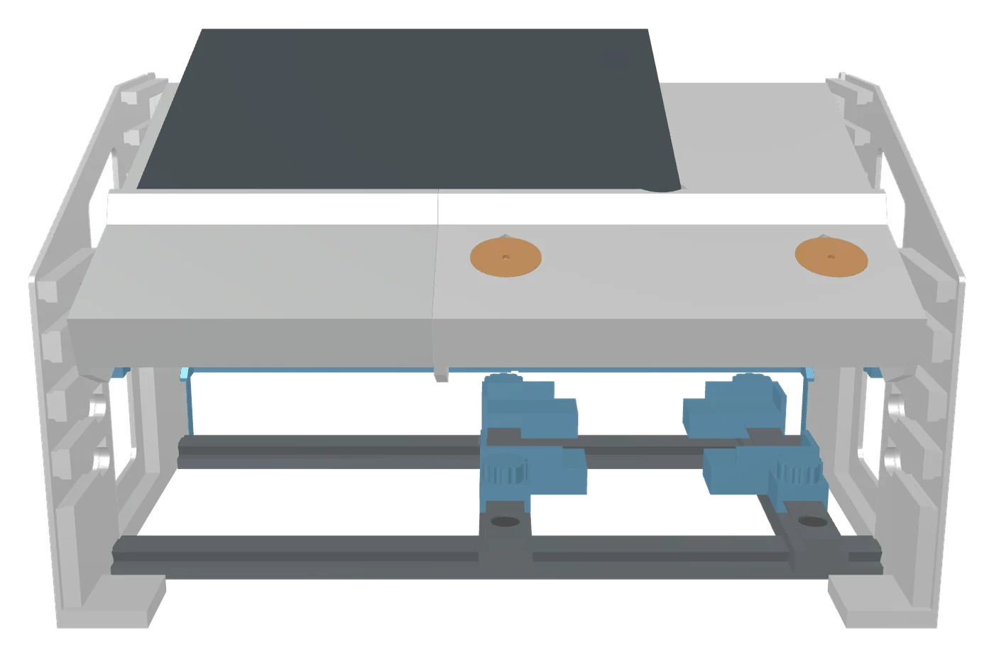 Front view of the trainer showing the two instrument ports in the plate, the hook slots on each stand and a module sitting on the rack.